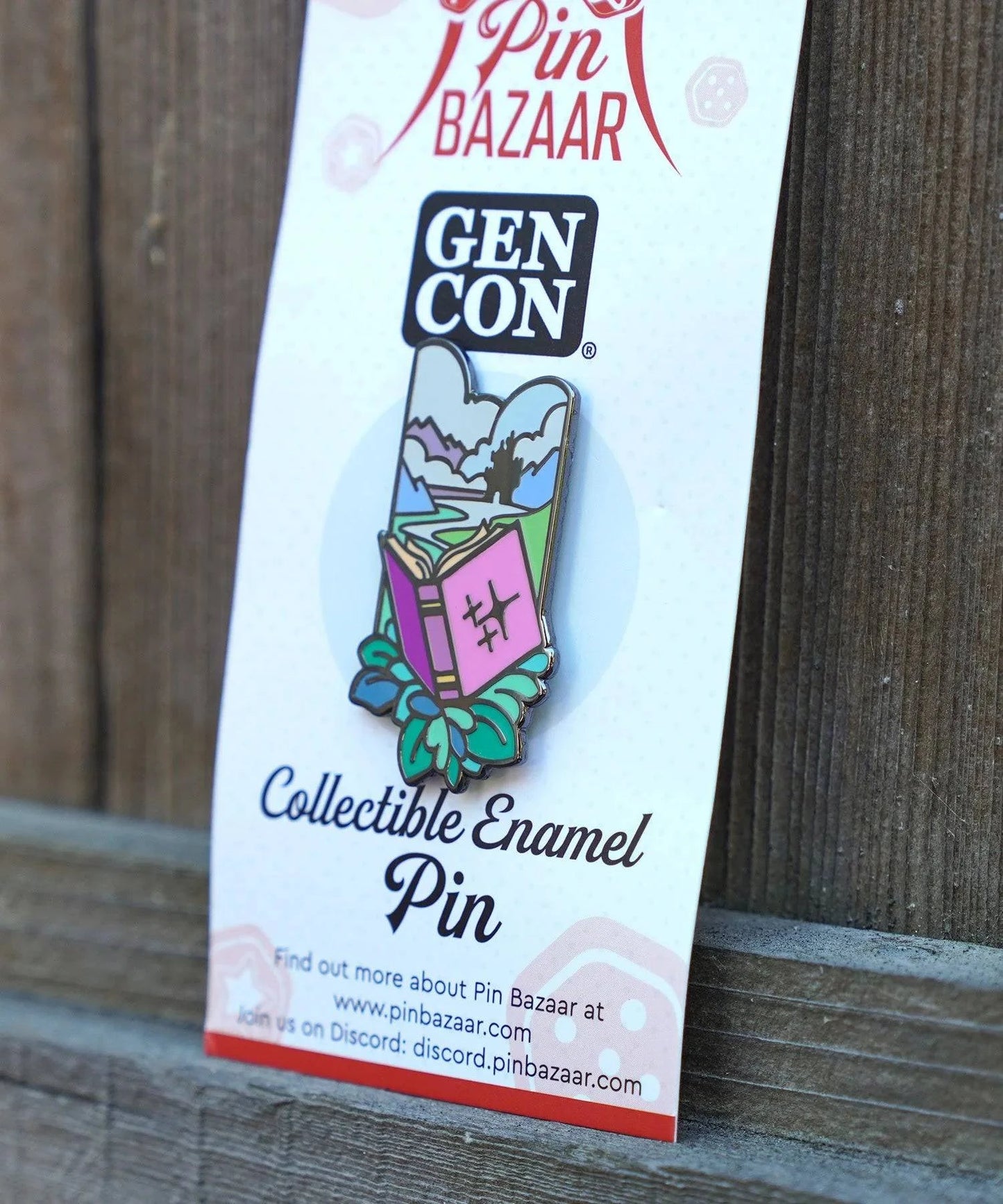 Limited edition Floral Spell Book enamel pin by Naomi VanDoren featuring colorful floral design, perfect for adventure and storytelling fans.