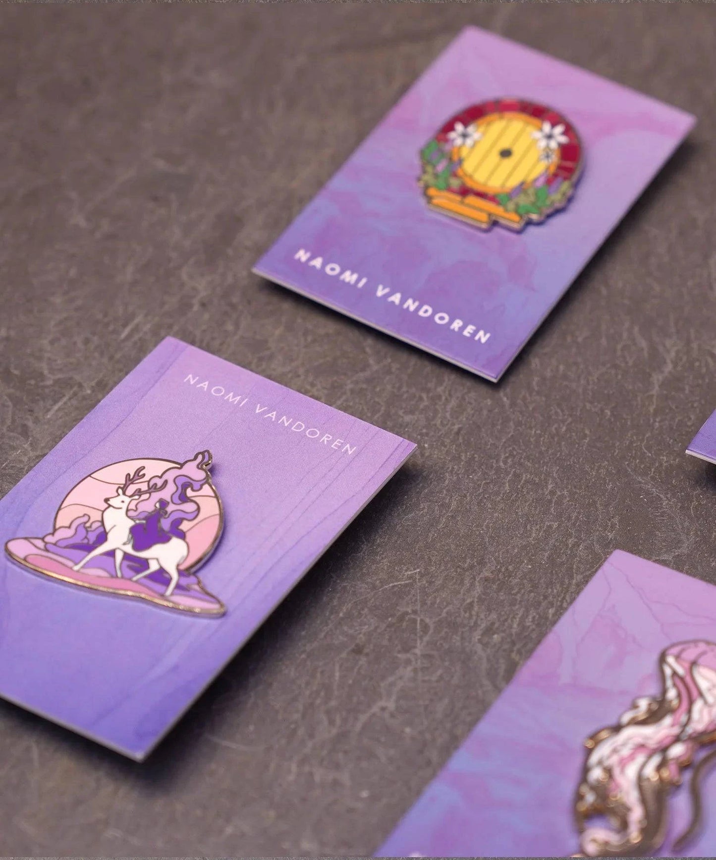 Enamel pin featuring "Miles to Go Before I Sleep" design by Naomi VanDoren, showcasing a whimsical adventure theme.