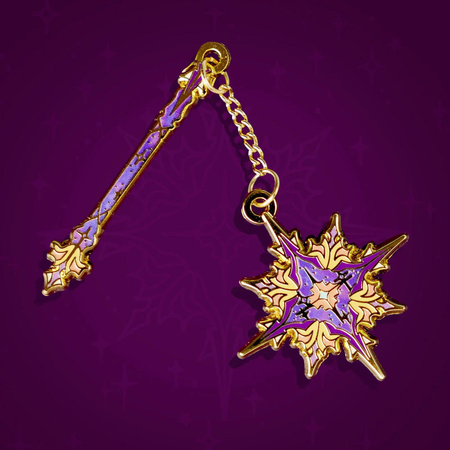 Celestial Armory Star Flail enamel pin by Naomi VanDoren featuring a detailed star-shaped flail design on a black background