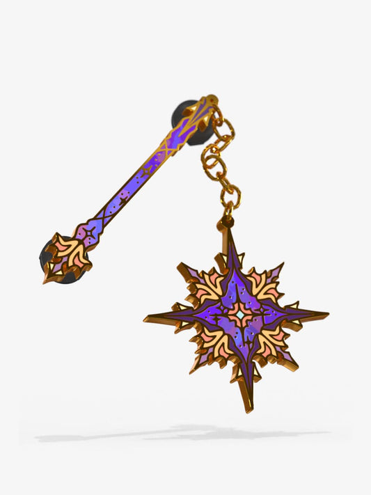 Celestial Armory Star Flail enamel pin by Naomi VanDoren on a white background, showcasing intricate details and vibrant colors.