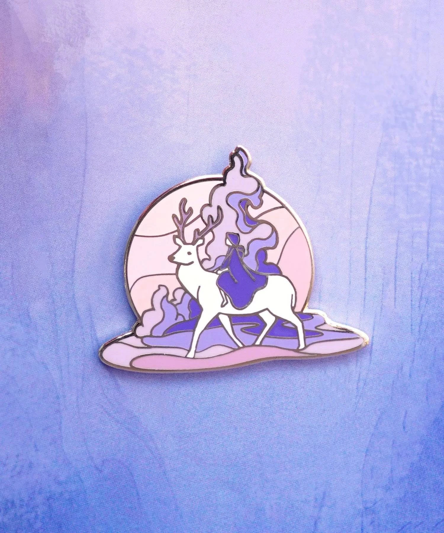 Enamel pin featuring a girl riding a horse, designed by Naomi VanDoren from Adventure Art & Stories, with detailed colorful artwork.