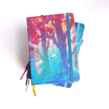 Stack of Naomi VanDoren Passage hardback notebooks featuring adventure art covers, ideal for writing and note-taking.