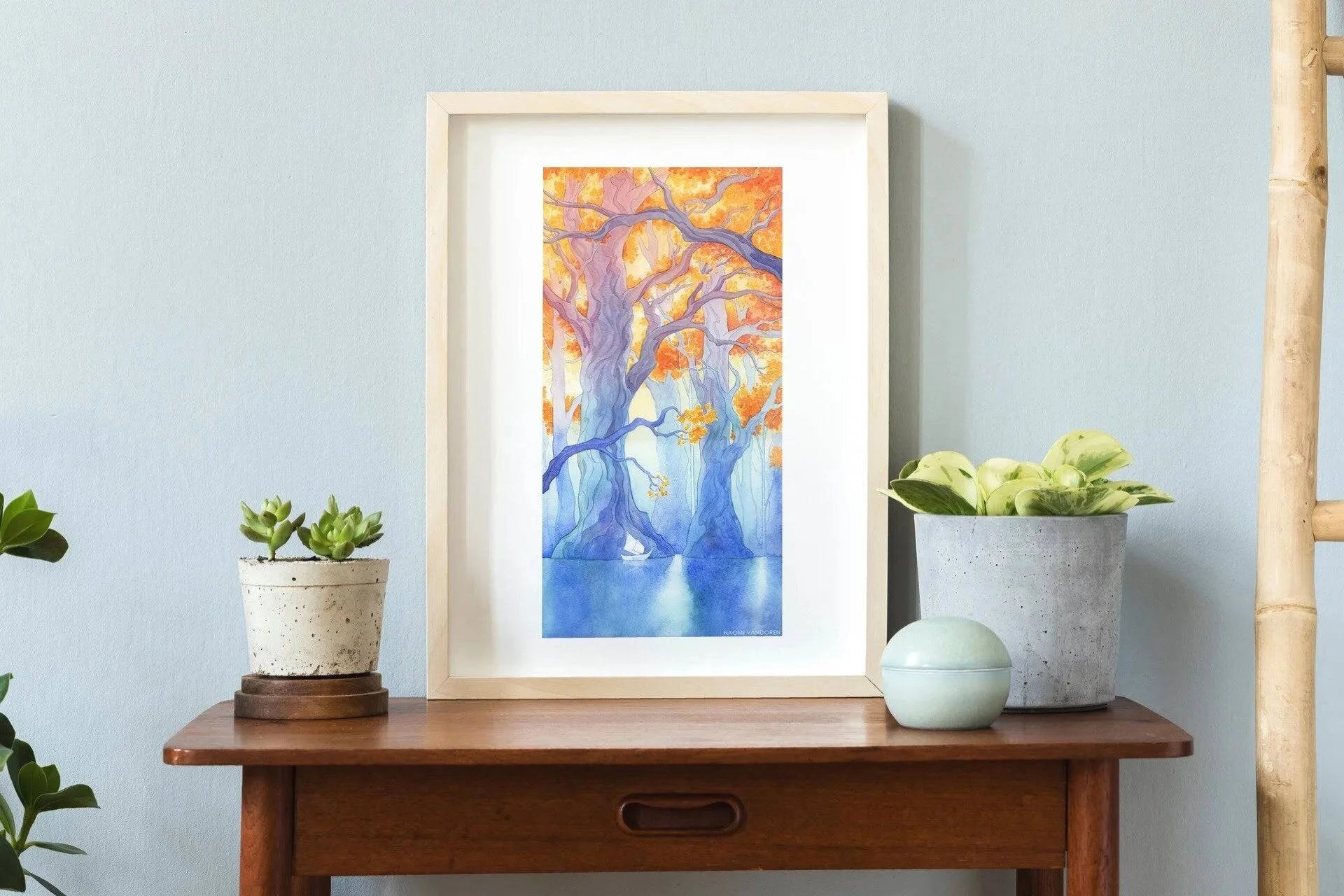 Framed art print titled "The Long Crossing" by Naomi VanDoren, featuring a detailed adventure-themed illustration.