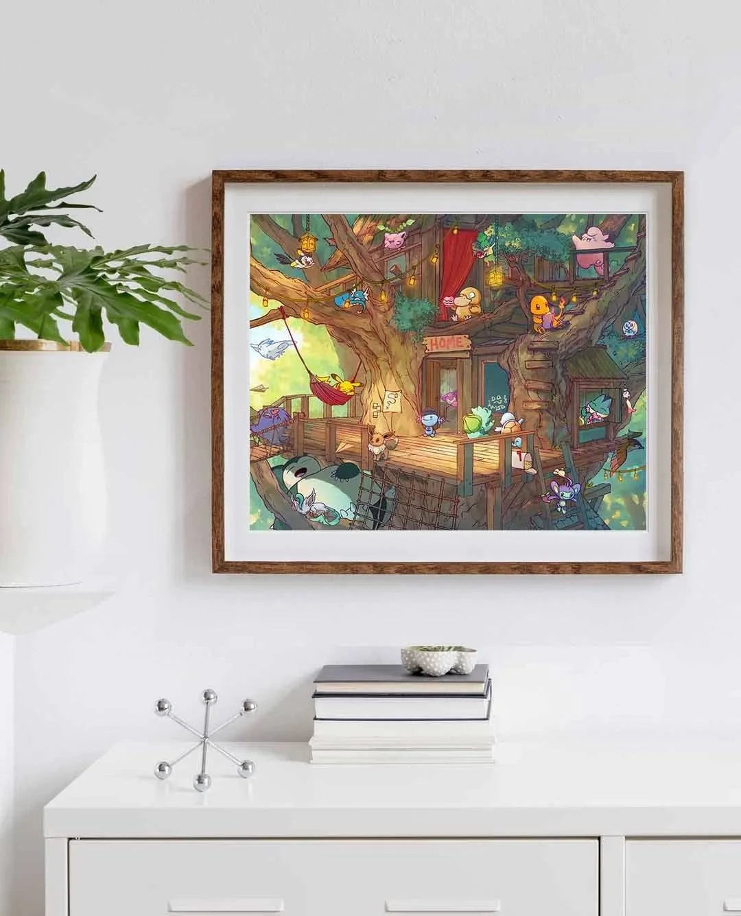 Framed Creature Collecting Treehouse art print by Naomi VanDoren featuring a whimsical treehouse scene with colorful creatures.